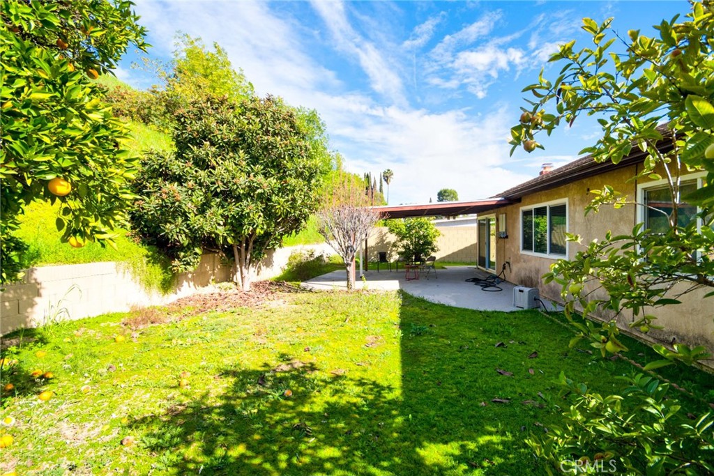 20309 East Vejar Road Walnut, CA 91789 - Photo 25 of 29 a view of a house with a yard