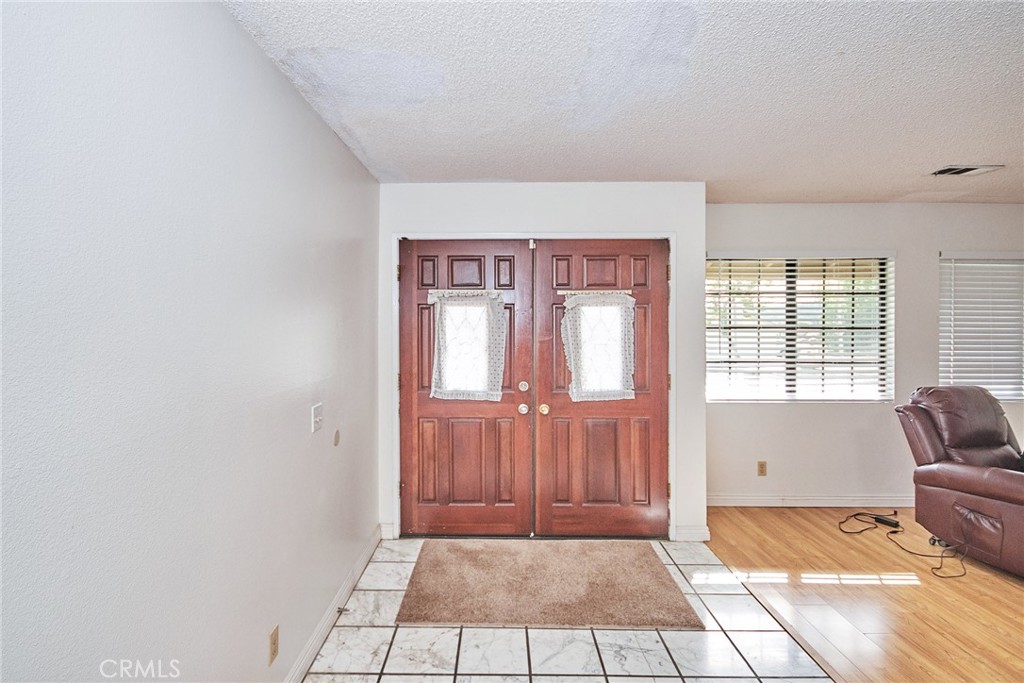 20309 East Vejar Road Walnut, CA 91789 - Photo 3 of 29 a living room with furniture and a window