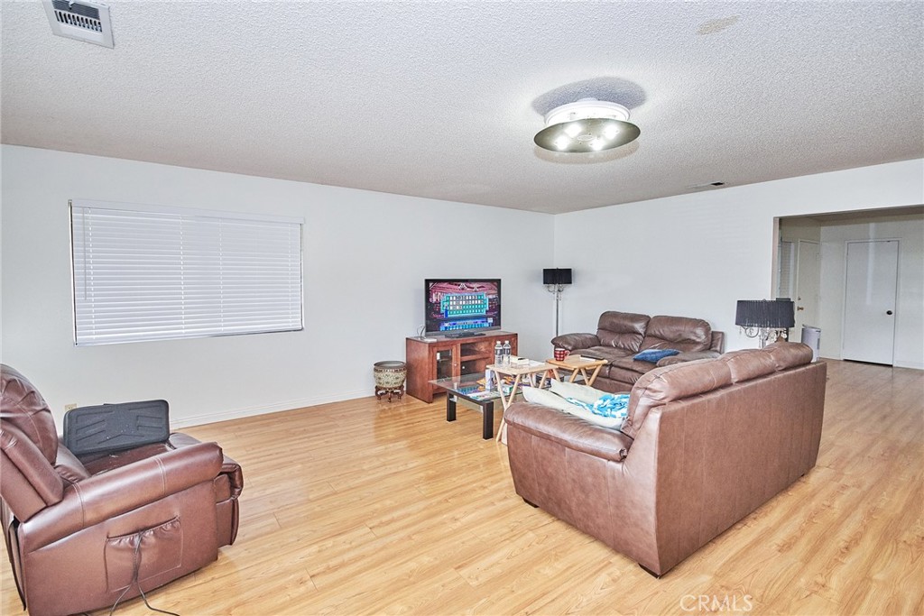 20309 East Vejar Road Walnut, CA 91789 - Photo 5 of 29 a living room with furniture and a wooden floor