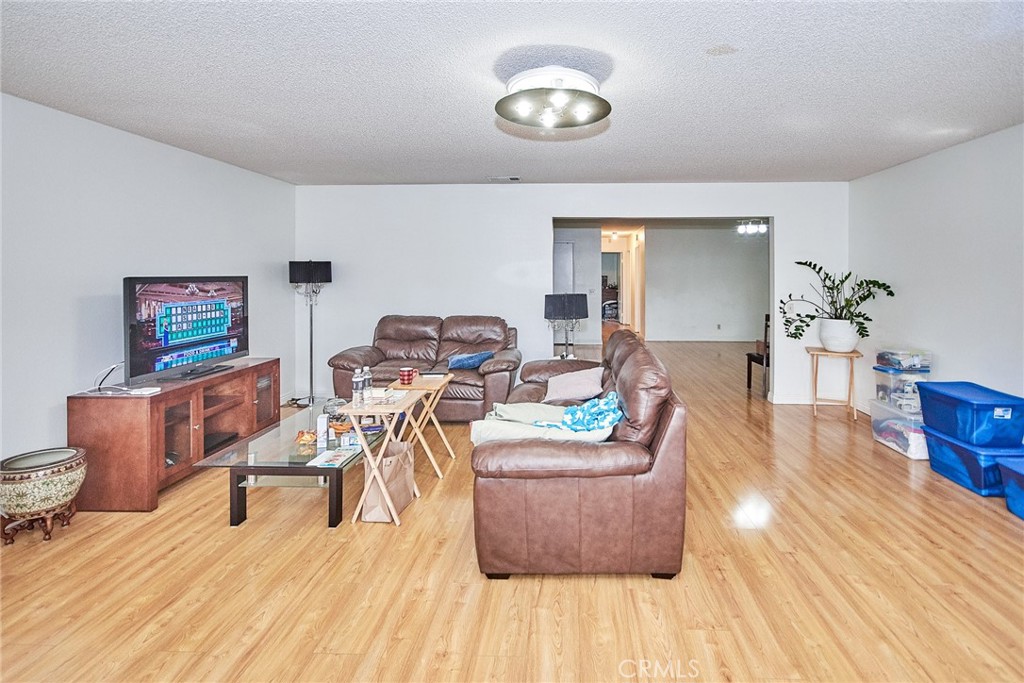 20309 East Vejar Road Walnut, CA 91789 - Photo 6 of 29 a living room with furniture and a wooden floor