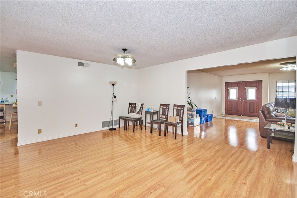 20309 East Vejar Road Walnut, CA 91789 - Photo 8 of 29 a view of a dining room with furniture and wooden floor