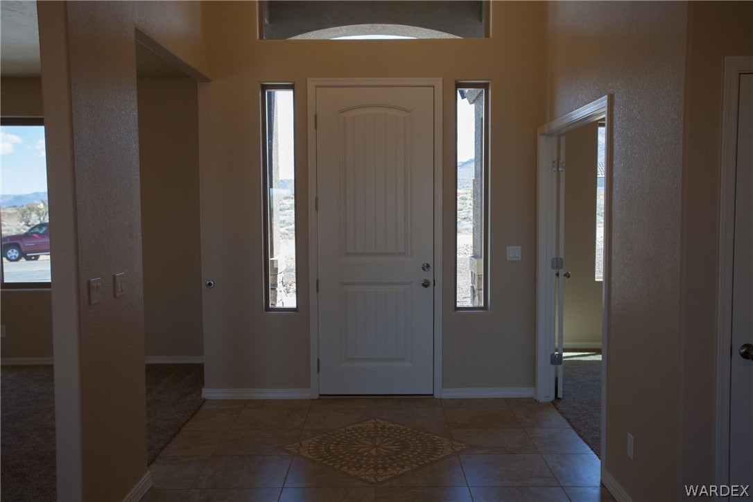 4861 North Neal Ranch Road Kingman, AZ 86401 - Photo 2 of 36 an empty room with windows