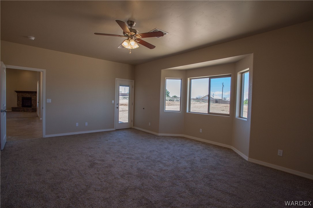 4861 North Neal Ranch Road Kingman, AZ 86401 - Photo 23 of 36 a view of an empty room with a window