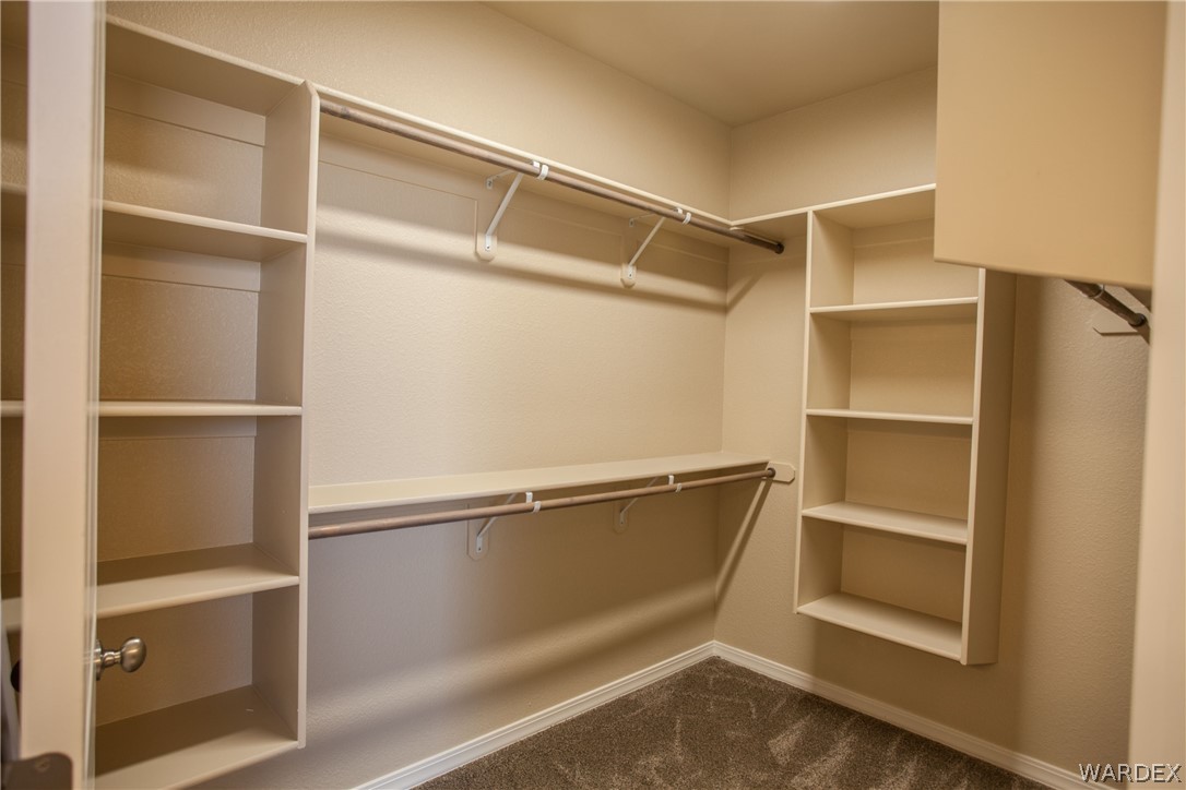 4861 North Neal Ranch Road Kingman, AZ 86401 - Photo 29 of 36 a view of an empty walk in closet