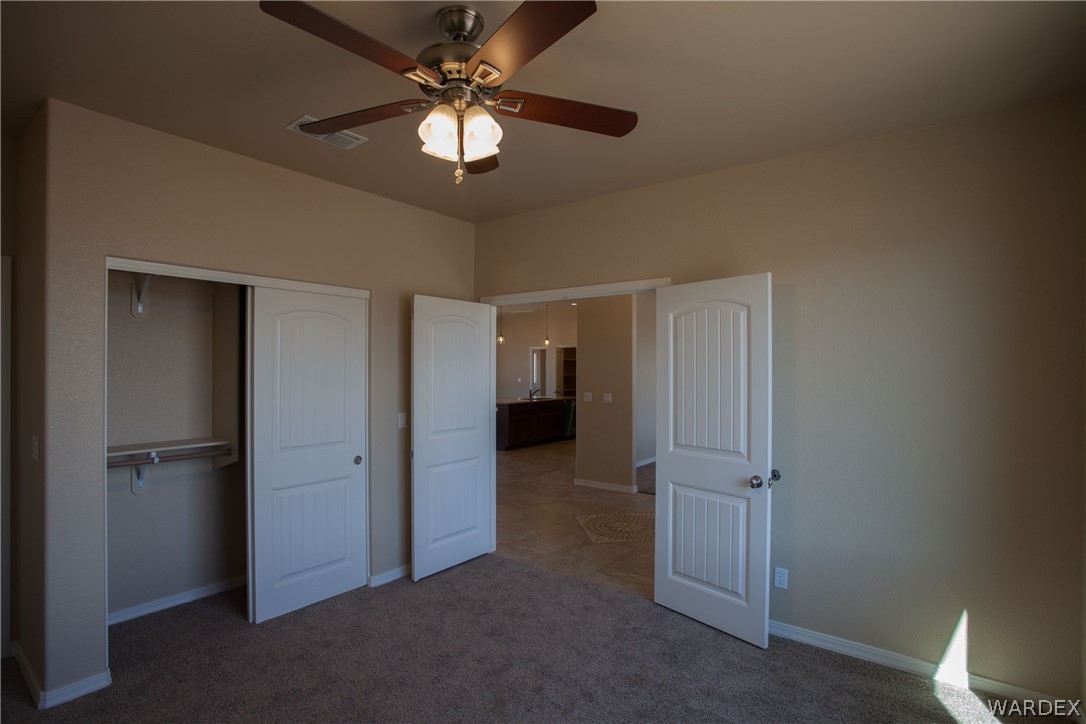 4861 North Neal Ranch Road Kingman, AZ 86401 - Photo 9 of 36 wooden floor in an empty room