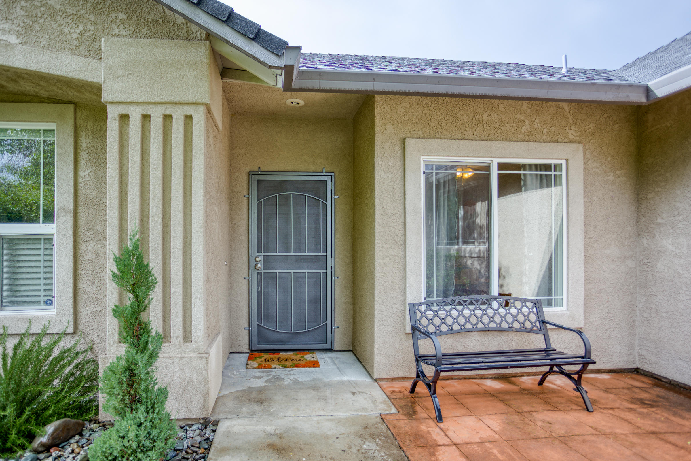2618 Rhinestone Way Redding, CA 96001 - Photo 3 of 58 a outdoor space with a glass door and furniture