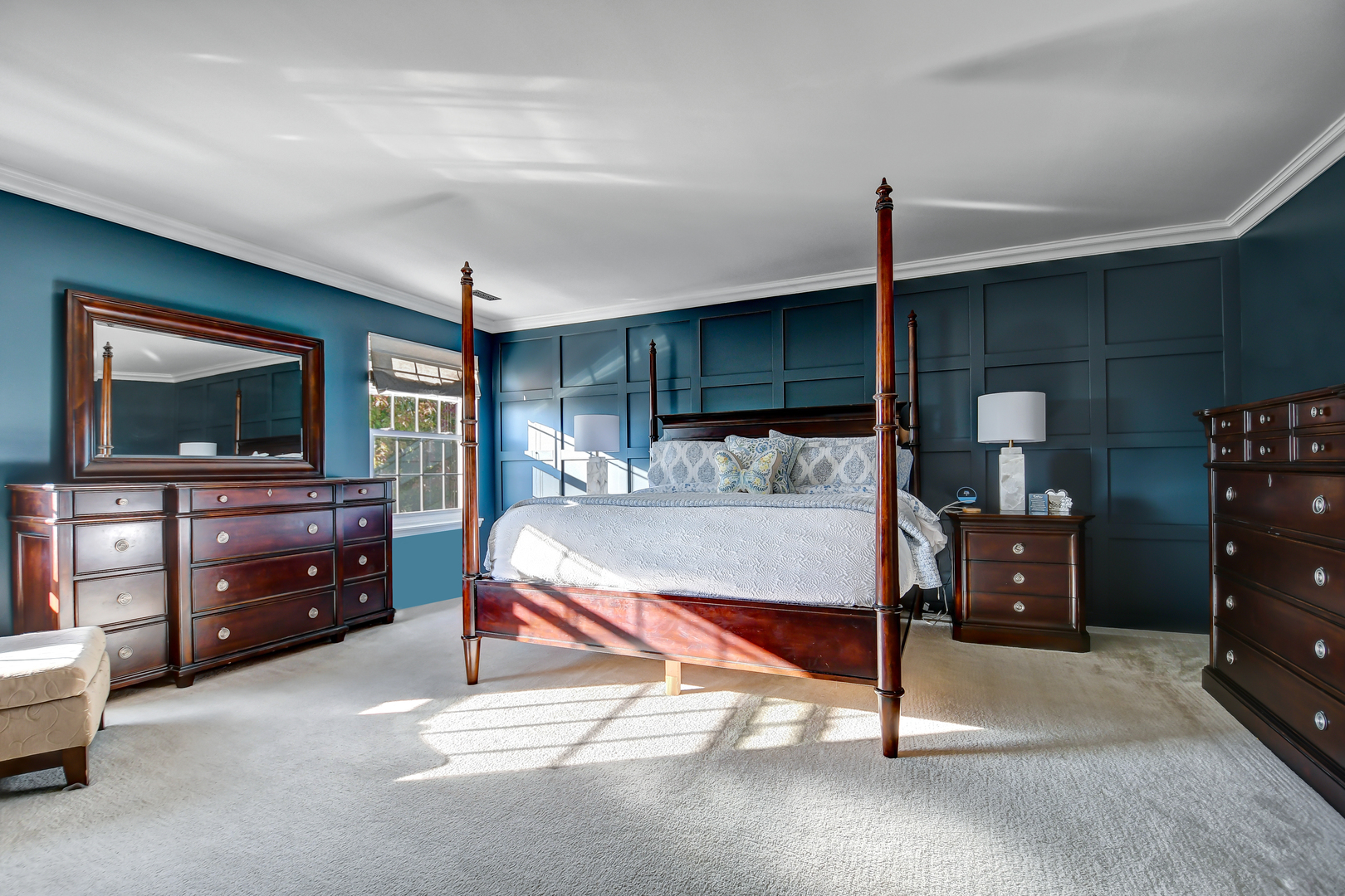 25758 South Basswood Road Channahon, IL 60410 - Photo 21 of 42 a bedroom with a bed and a flat tv screen on wall