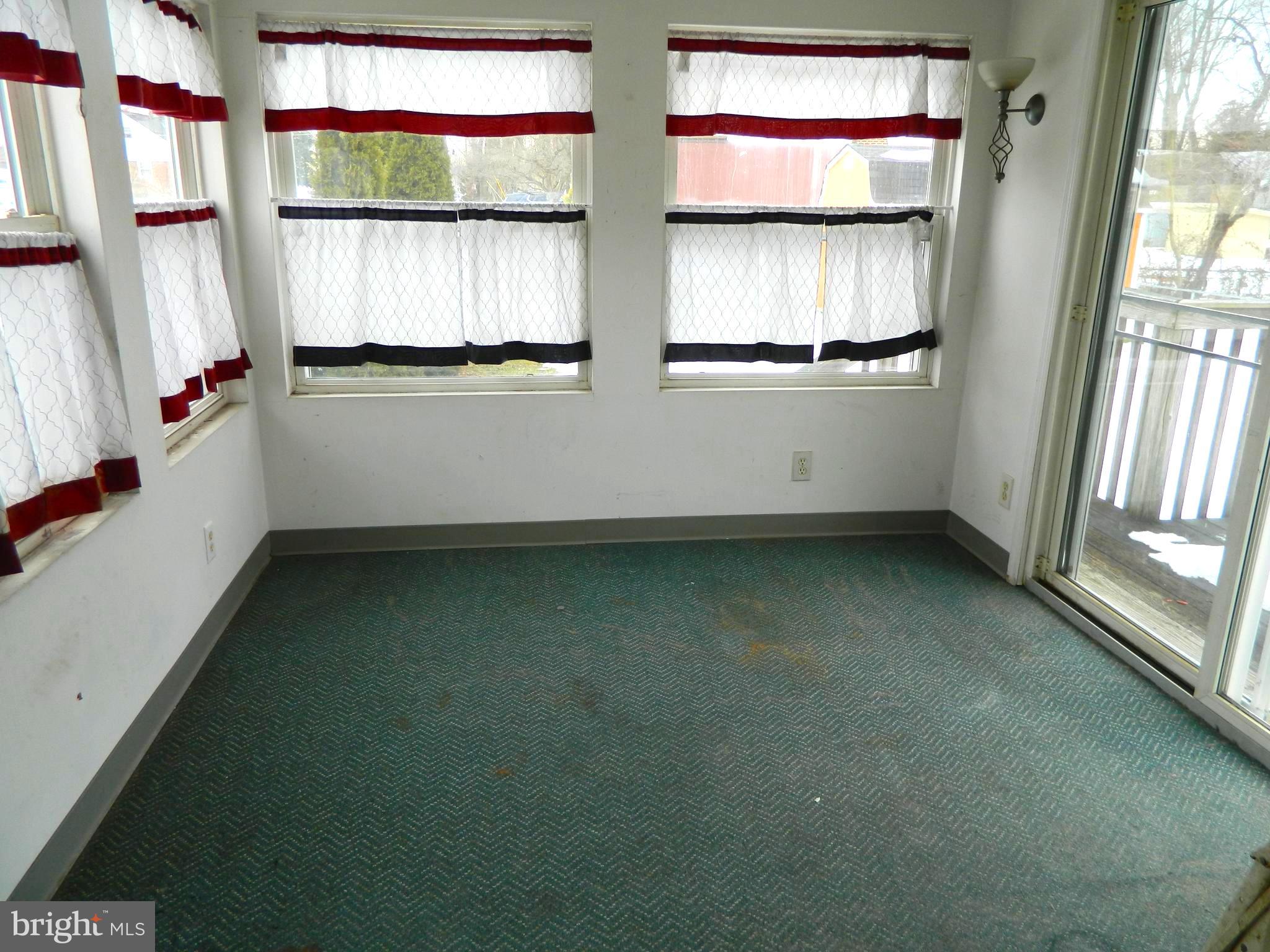 452 East Browning Road Bellmawr, NJ 08031 - Photo 10 of 15 Sunroom with slider doors to deck