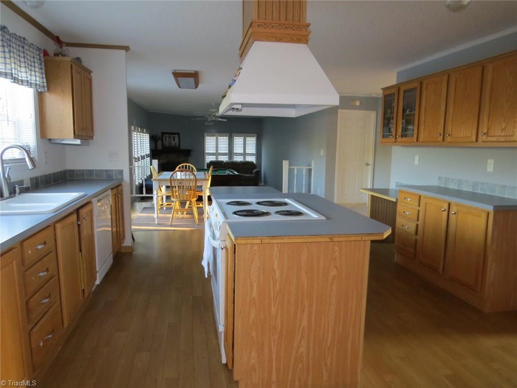 121 Alcorn Loop Ruffin, NC 27326 - Photo 4 of 19 Kitchen has Island and Desk Area