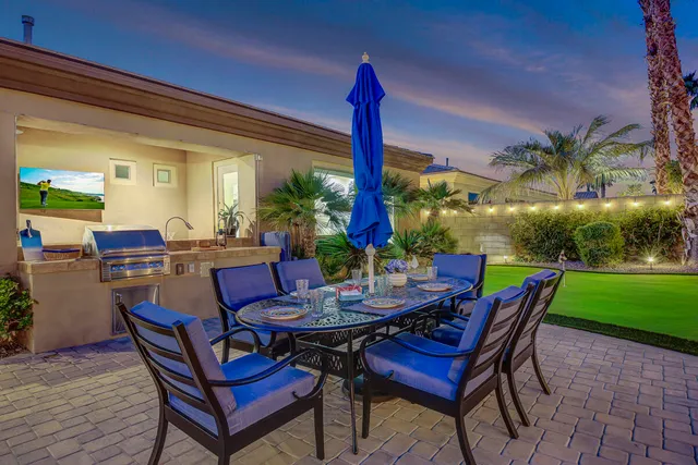 a kitchen with a sink cabinets and refrigerator
