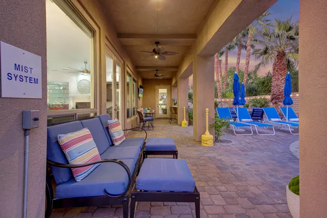 a view of a dining room with furniture window and outside view