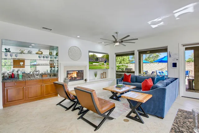 a bedroom with a bed and a table