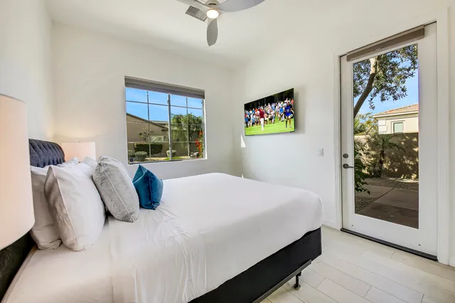 a small swimming pool with outdoor seating