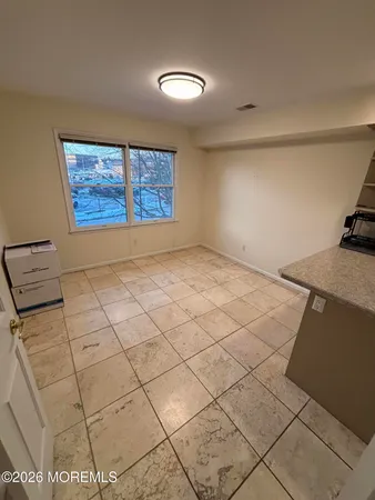 a bathroom with a toilet and a sink