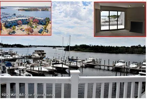a view of a lake with outdoor seating