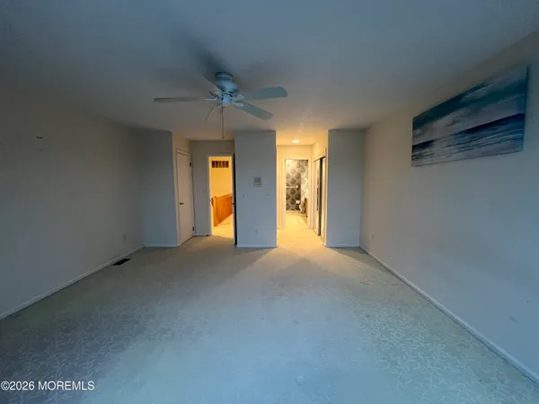 an empty room with windows