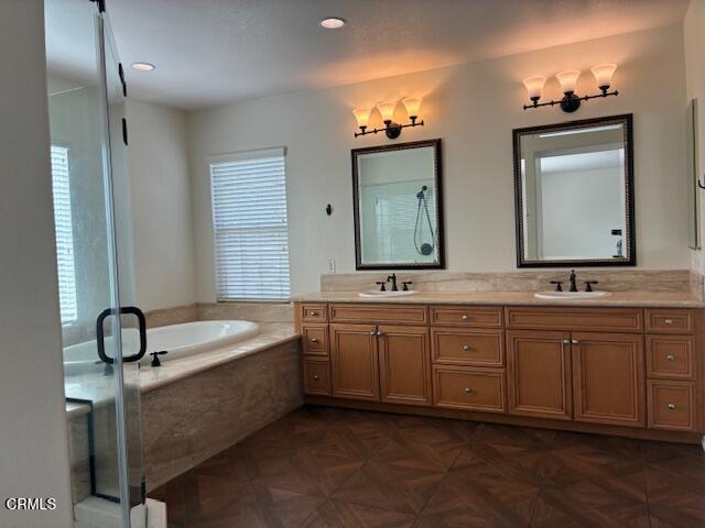 4153 Caribbean Street Oxnard, CA 93035 - Photo 15 of 22 a bathroom with a double vanity sink and a mirror