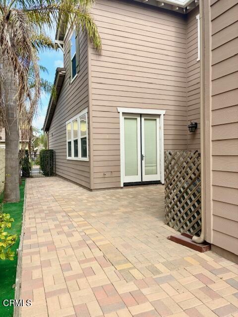 4153 Caribbean Street Oxnard, CA 93035 - Photo 18 of 22 a view of a entryway door of the house