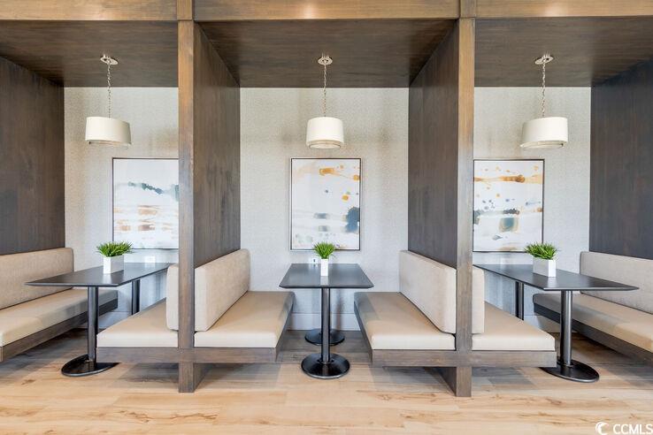 8840 Henry Road, Unit DEWBERRY Longs, SC 29568 - Photo 18 of 29 Dining space featuring wood finished floors