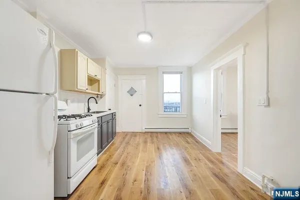 a kitchen with granite countertop lots of counter top space
