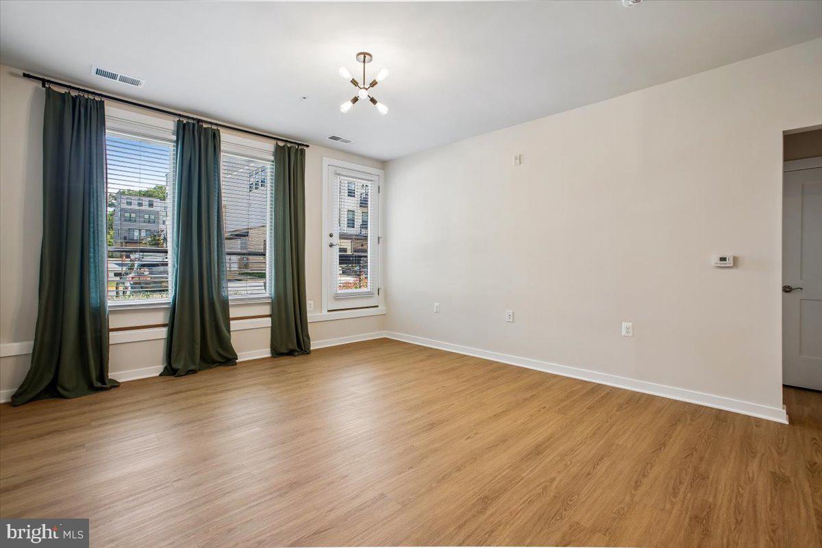 1669 Bandit Loop, Unit 105A Reston, VA 20190 - Photo 14 of 58 LVP Flooring, Modern Lighting