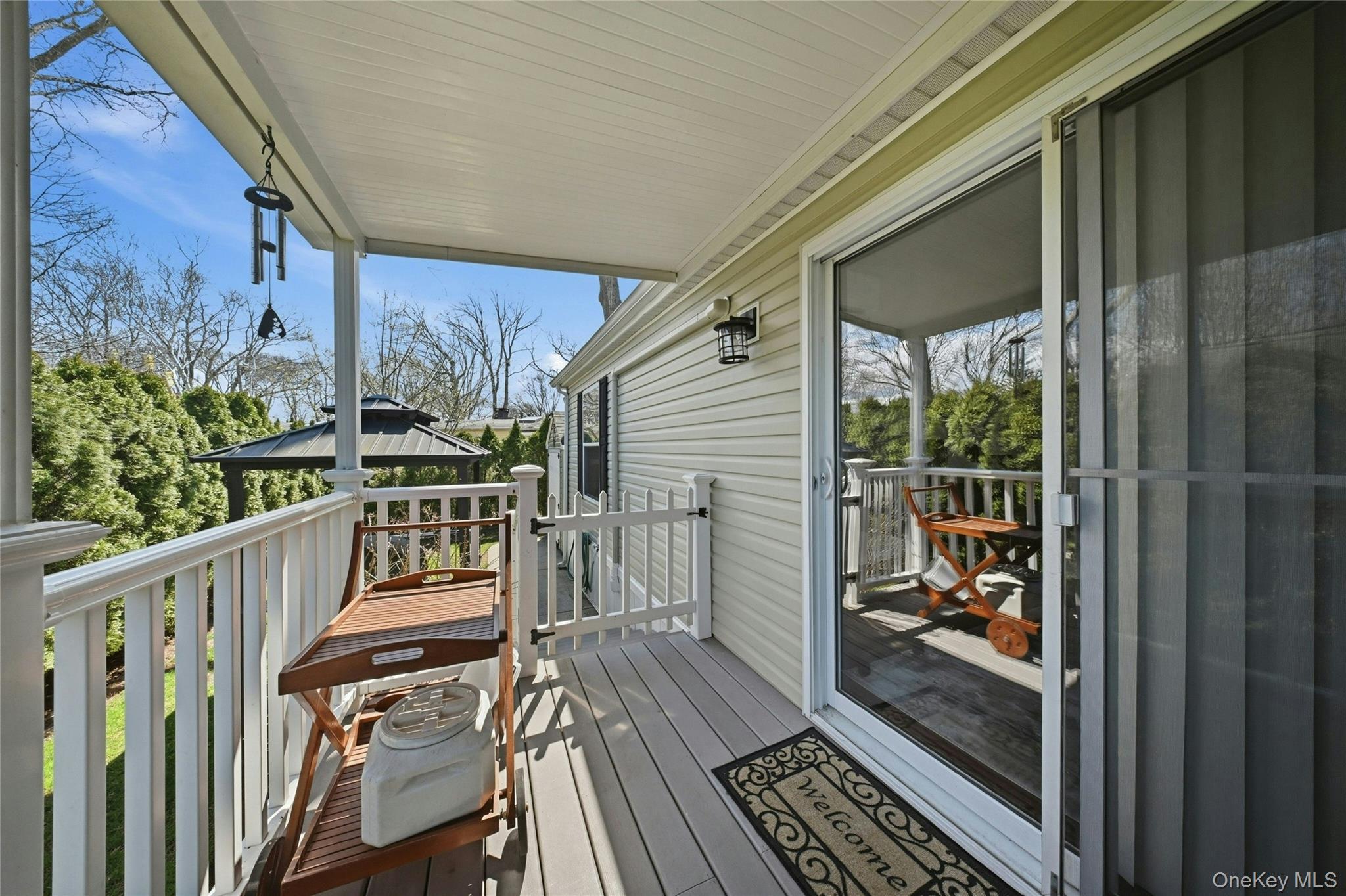 1661 Old Country Road, Unit 62 Riverhead, NY 11901 - Photo 30 of 36 Covered Porch
