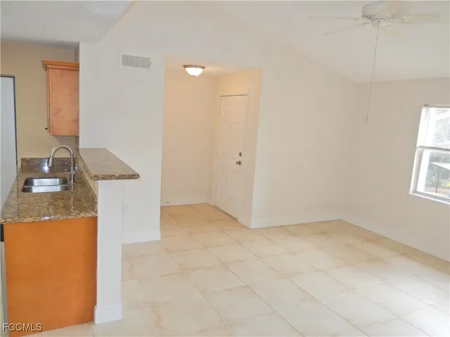 a view of an outdoor space and tennis court