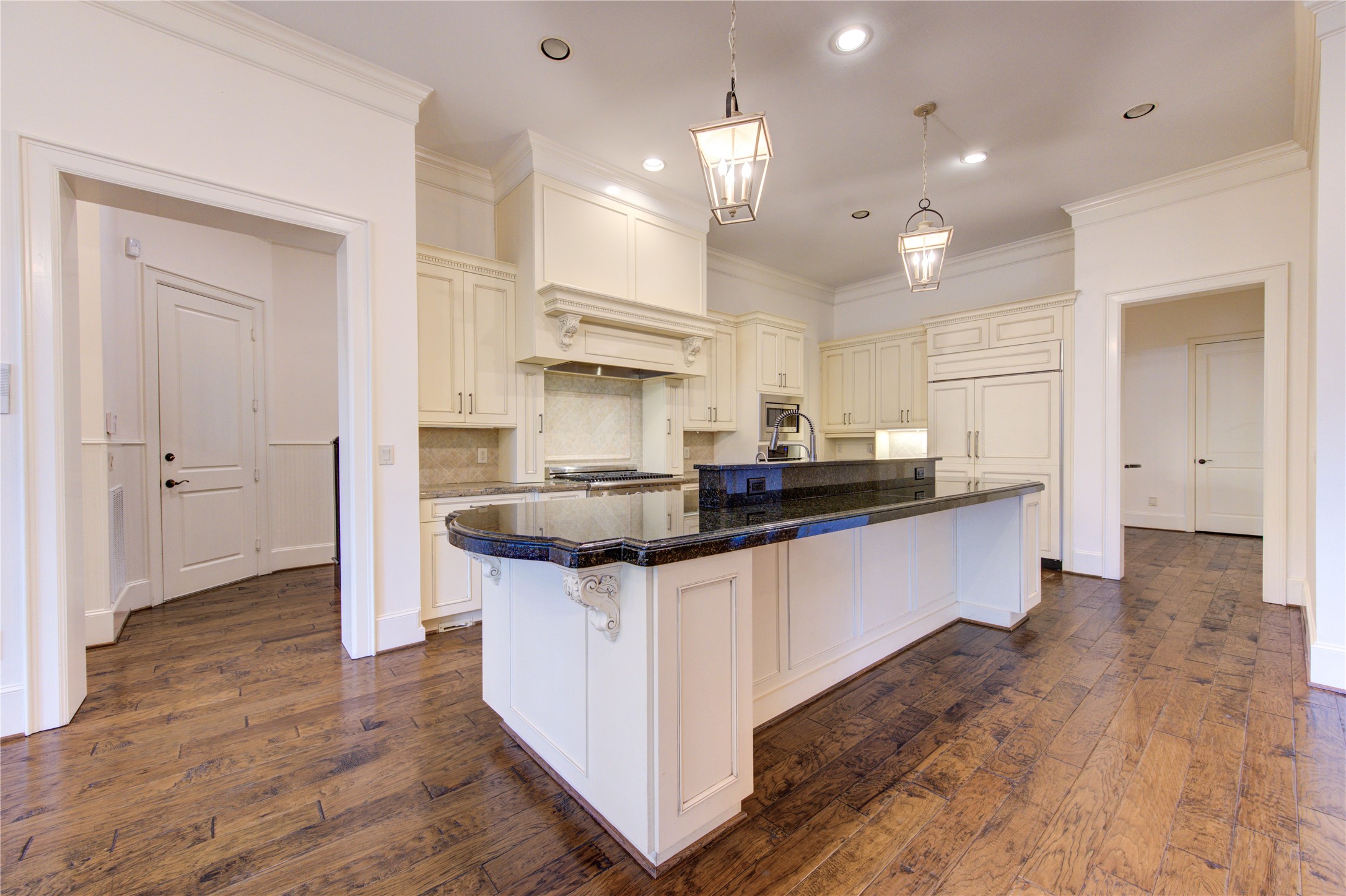 4615 Laurel Street Bellaire, TX 77401 - Photo 16 of 48 Gourmet kitchen with eat at island bar and loads of cabinets & counter spaces.