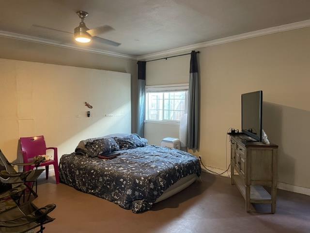 411 Lewis Street Gilroy, CA 95020 - Photo 14 of 22 a bedroom with a bed and dresser with mirror