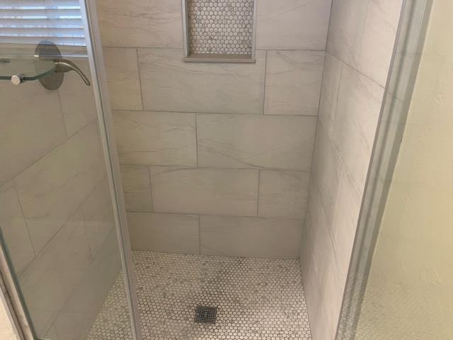 411 Lewis Street Gilroy, CA 95020 - Photo 9 of 22 a bathroom with a shower