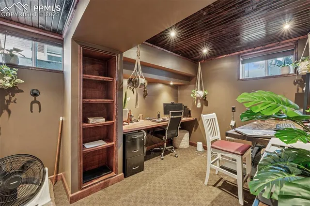 a room with a table and chairs