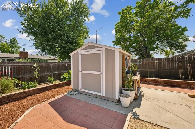 a view of backyard with green space