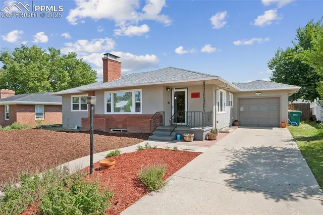 a front view of a house with a patio