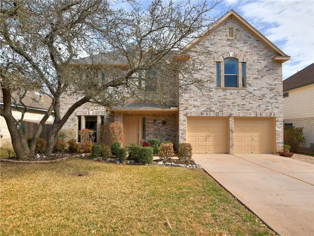 a front view of house with yard