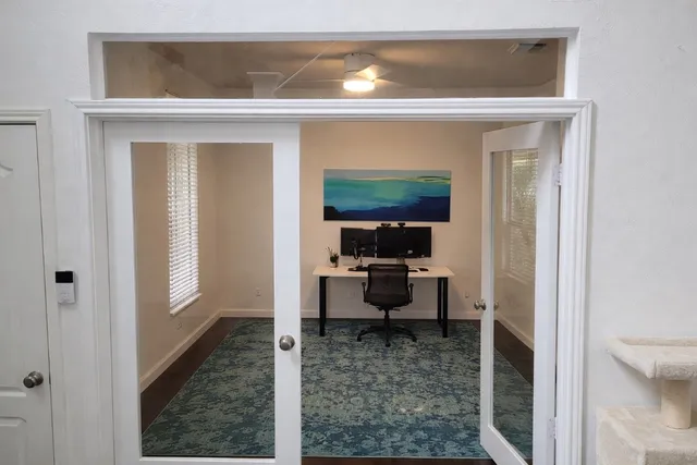 a en suite bathroom with a toilet sink and mirror