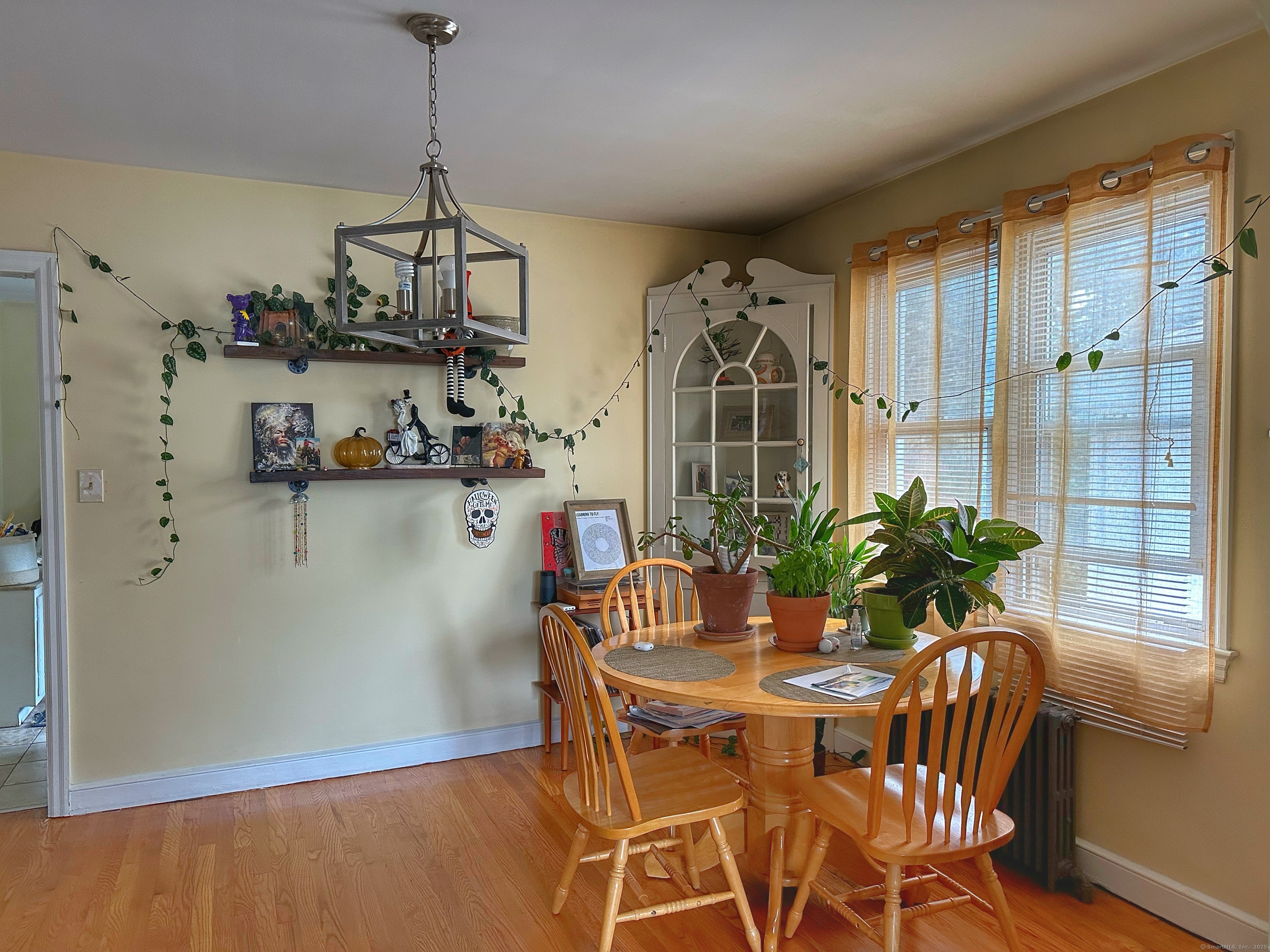 181 Fox Street, Unit 2 Bridgeport, CT 06605 - Photo 3 of 7 a view of a dining room with furniture window and outside view