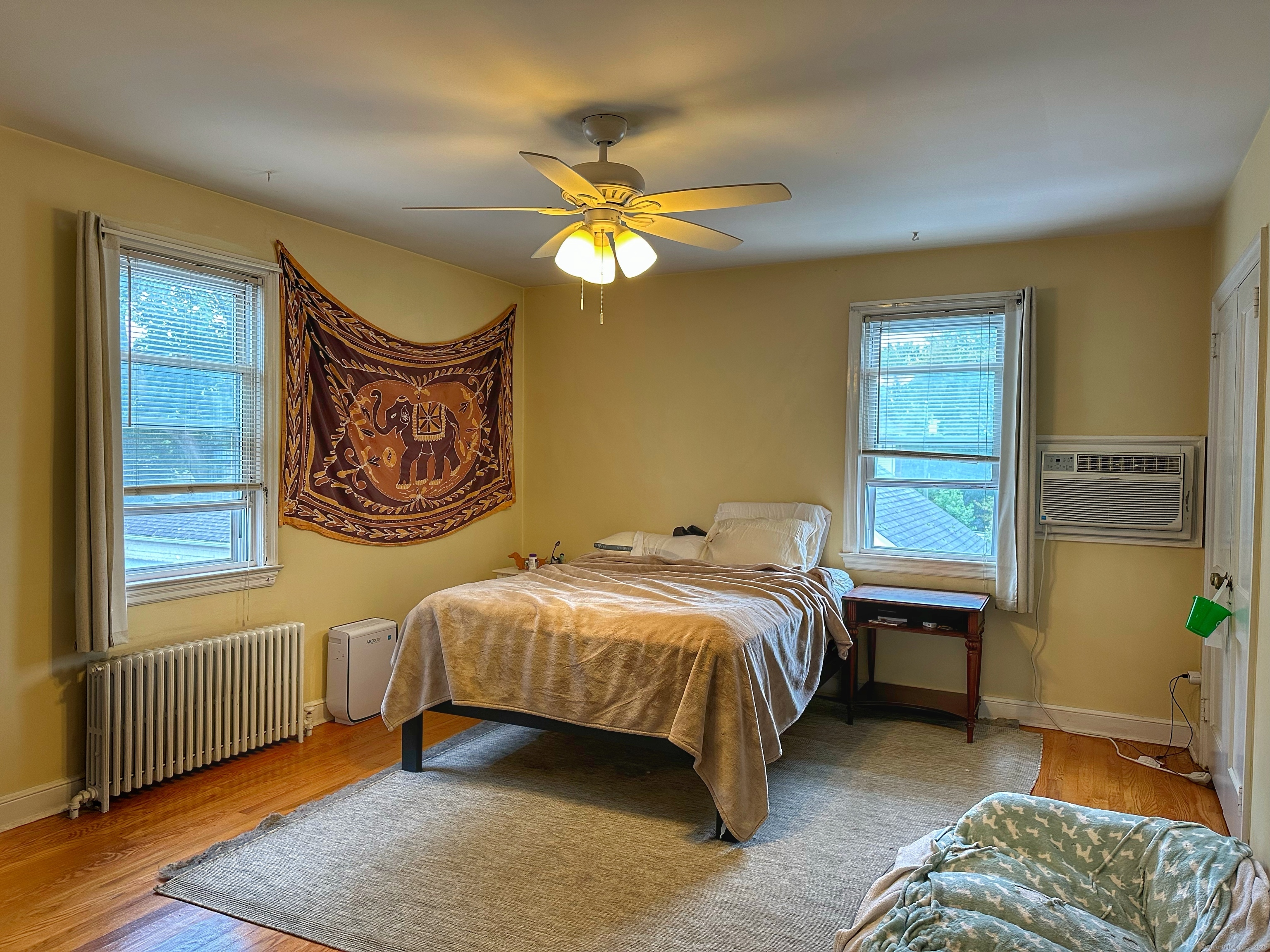 181 Fox Street, Unit 2 Bridgeport, CT 06605 - Photo 7 of 7 a bedroom with a bed and a window