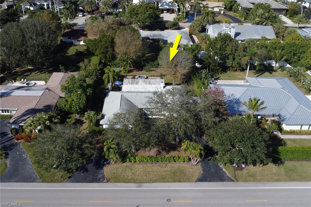 1999 Alamanda Drive Naples, FL 34102 - Photo 23 of 24 an aerial view of a house with a garden