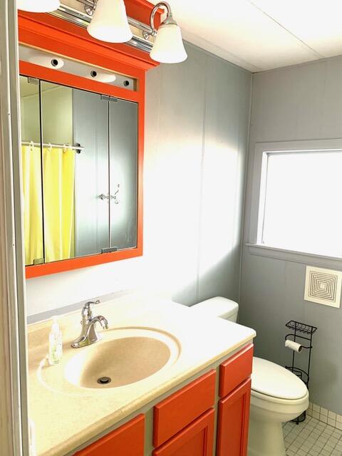 169 Tanforan Rancho Mirage, CA 92270 - Photo 11 of 19 a bathroom with a sink and a mirror