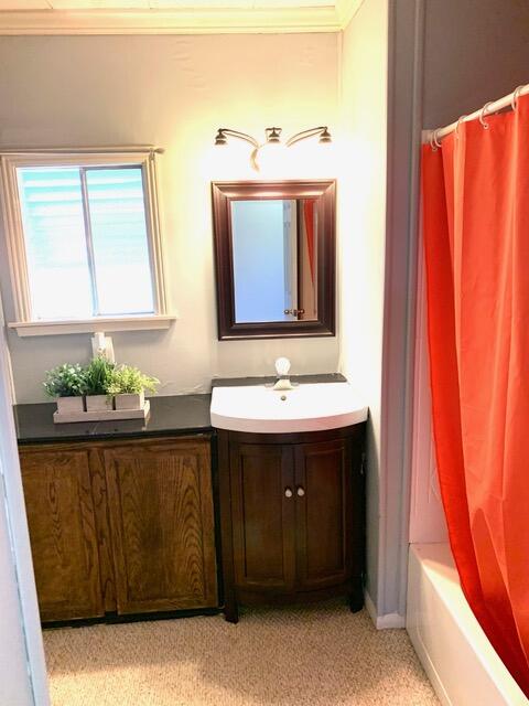 169 Tanforan Rancho Mirage, CA 92270 - Photo 15 of 19 a bathroom with a sink and a mirror
