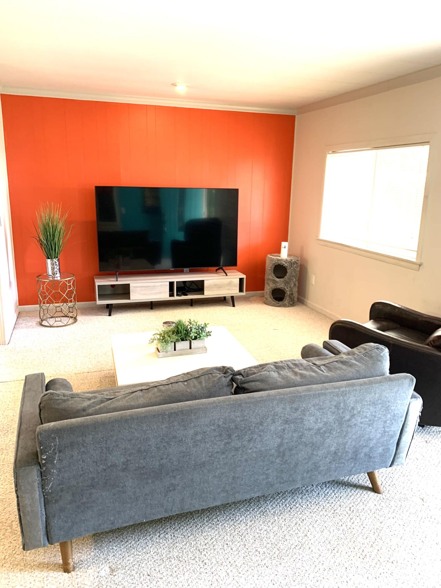 169 Tanforan Rancho Mirage, CA 92270 - Photo 3 of 19 a living room with furniture and a flat screen tv