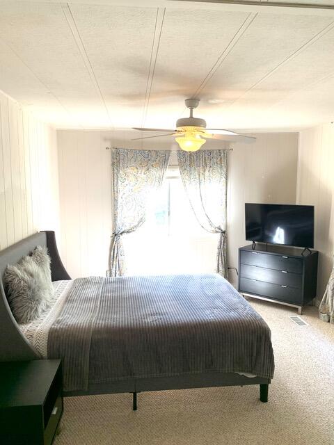 169 Tanforan Rancho Mirage, CA 92270 - Photo 8 of 19 a bedroom with a bed and a flat screen tv
