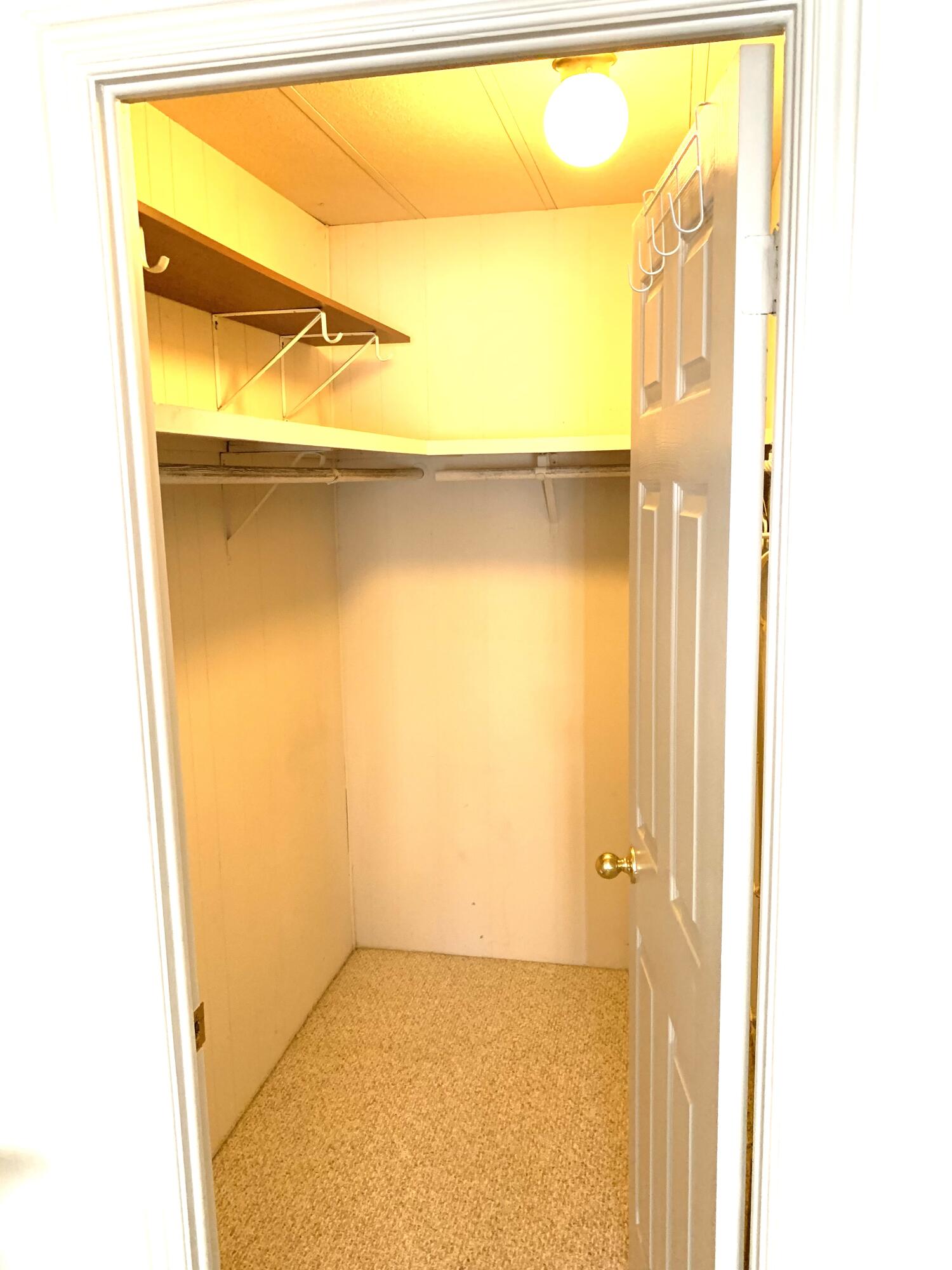 169 Tanforan Rancho Mirage, CA 92270 - Photo 10 of 19 a view of a room with a door and a window