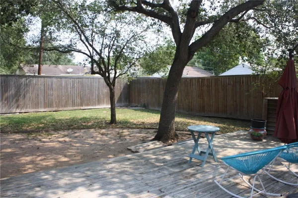 a backyard of a house with seating space