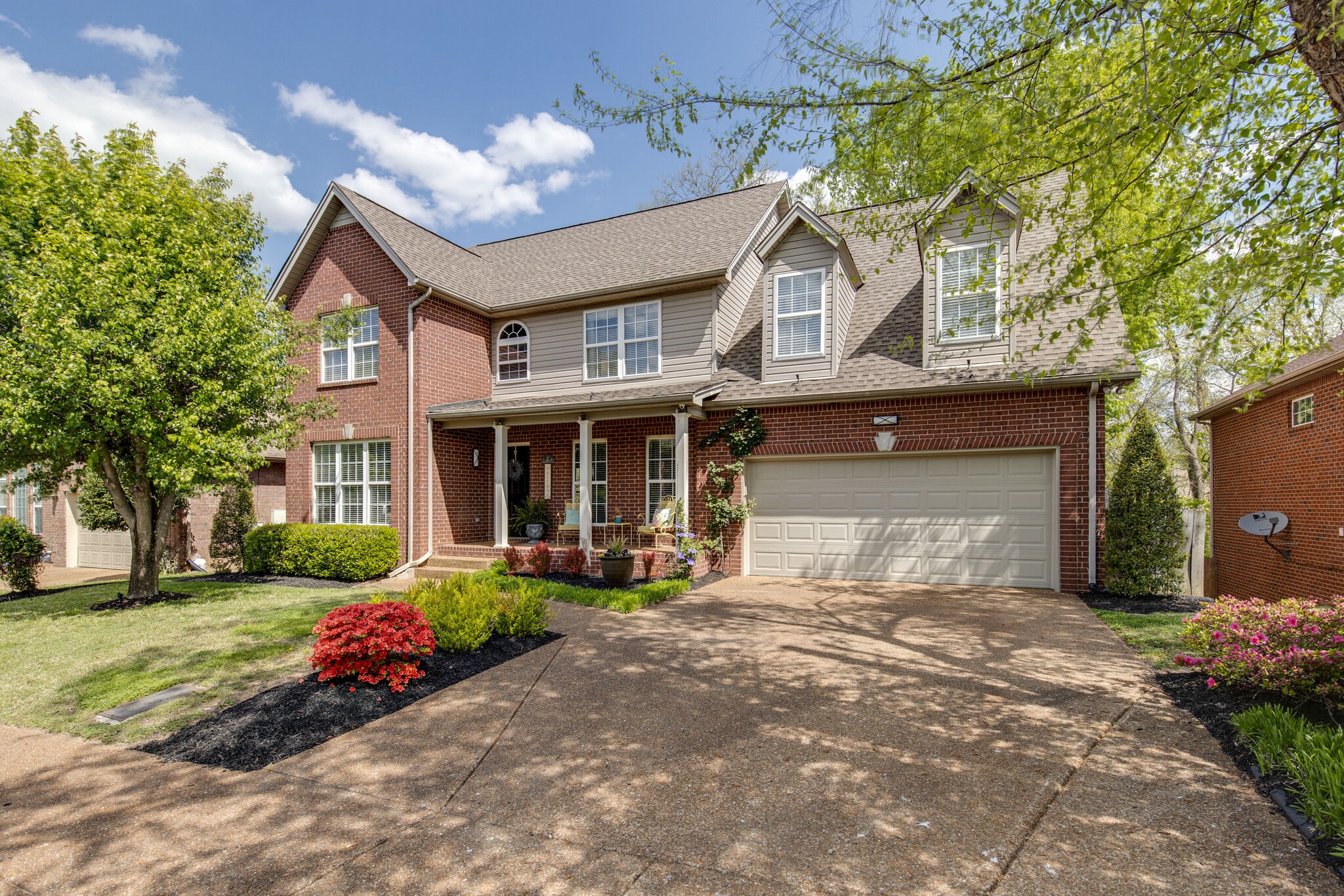 5236 Ridgefalls Way Antioch, TN 37013 - Photo 2 of 35 a front view of a house with yard and green space