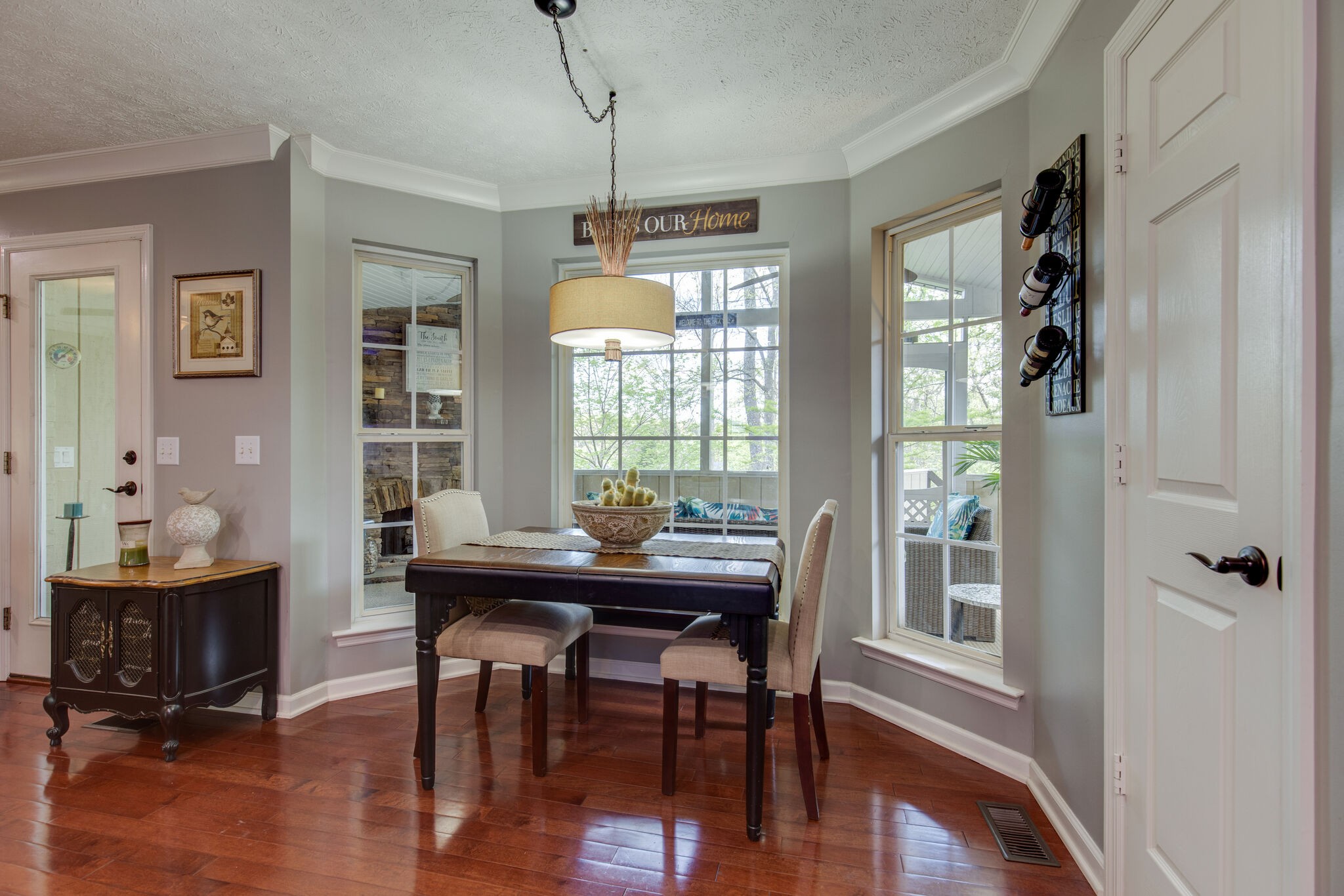 5236 Ridgefalls Way Antioch, TN 37013 - Photo 11 of 35 a view of a dining room with furniture window and wooden floor