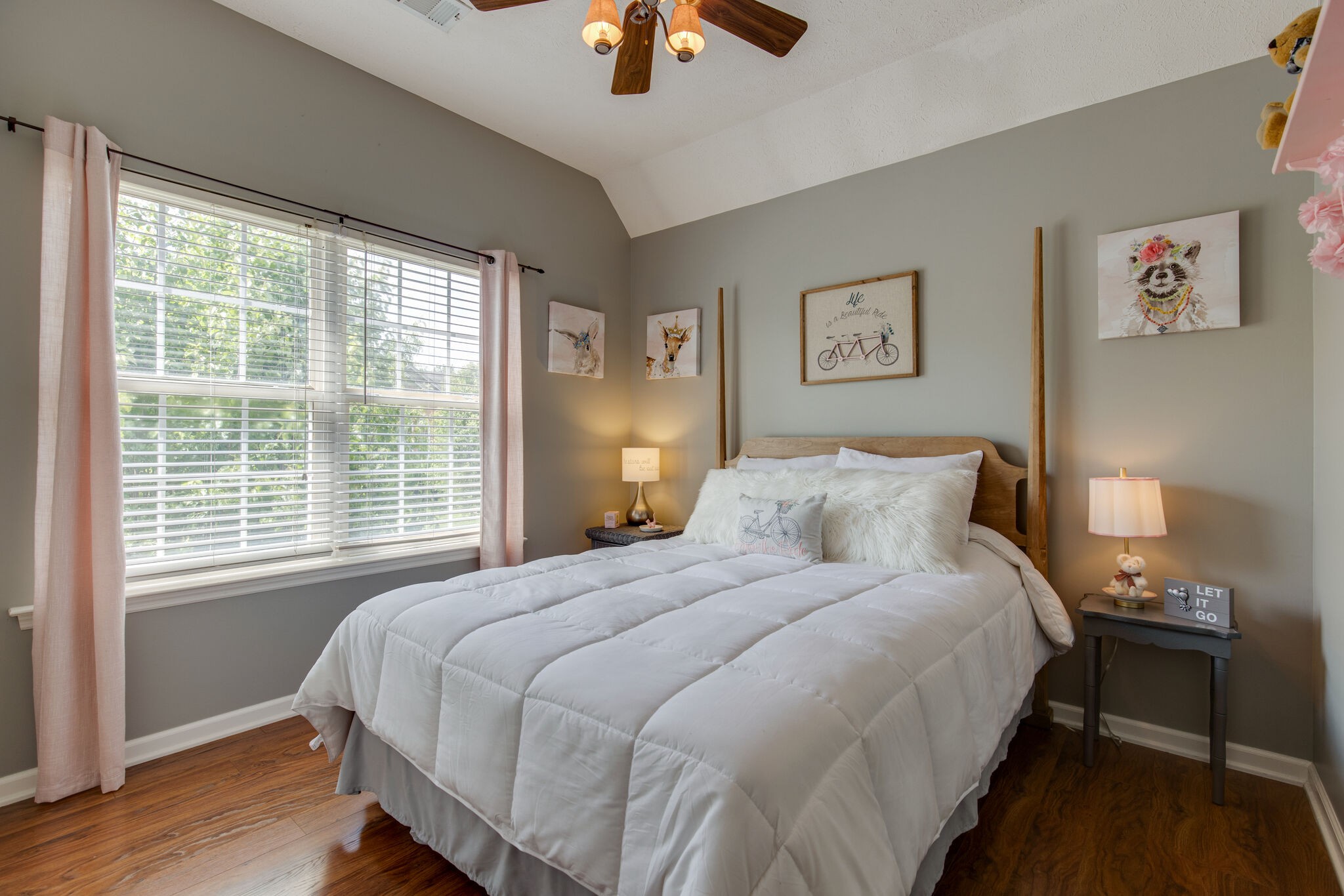 5236 Ridgefalls Way Antioch, TN 37013 - Photo 13 of 35 a bedroom with a bed and a chandelier