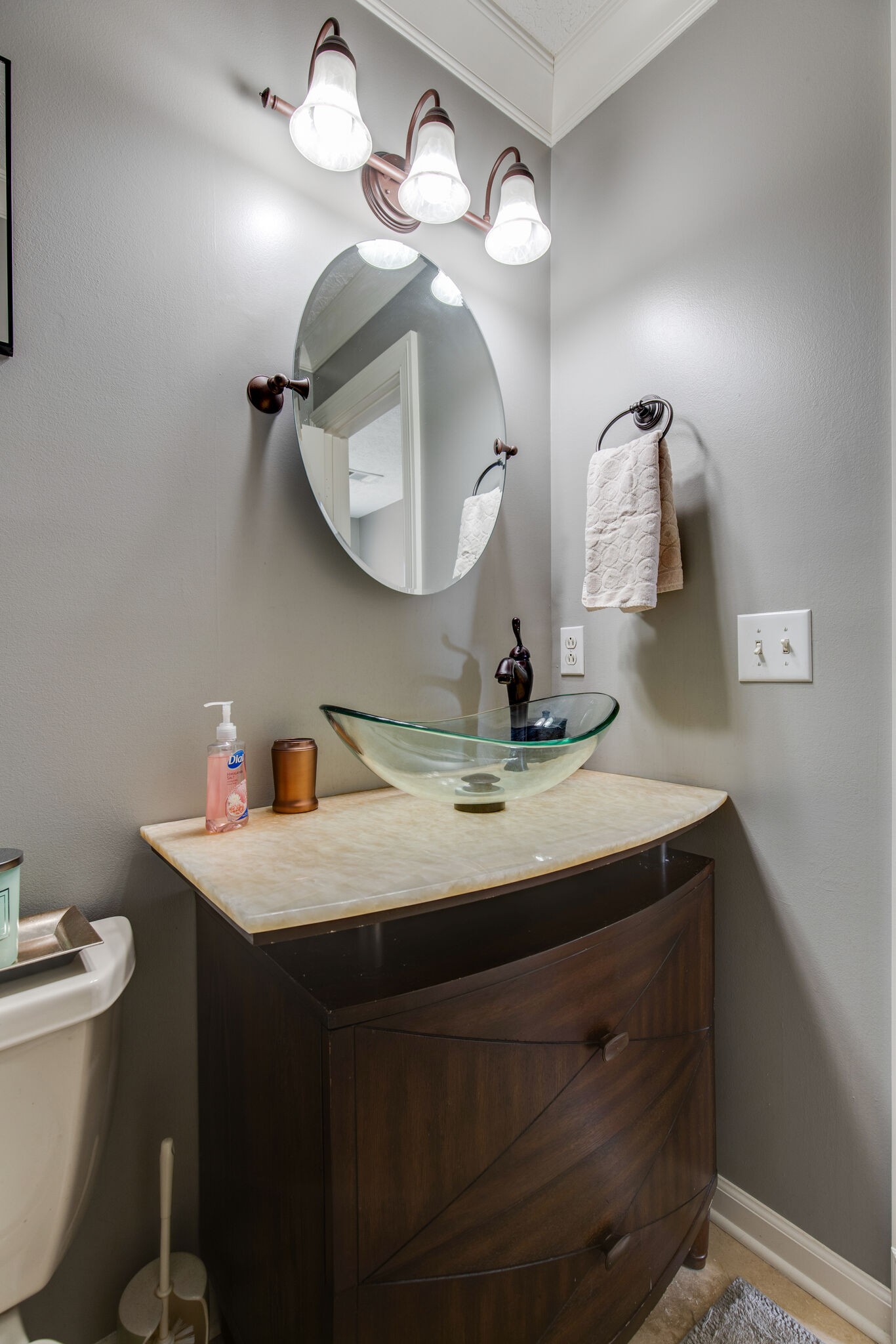 5236 Ridgefalls Way Antioch, TN 37013 - Photo 16 of 35 a bathroom with a sink and a mirror