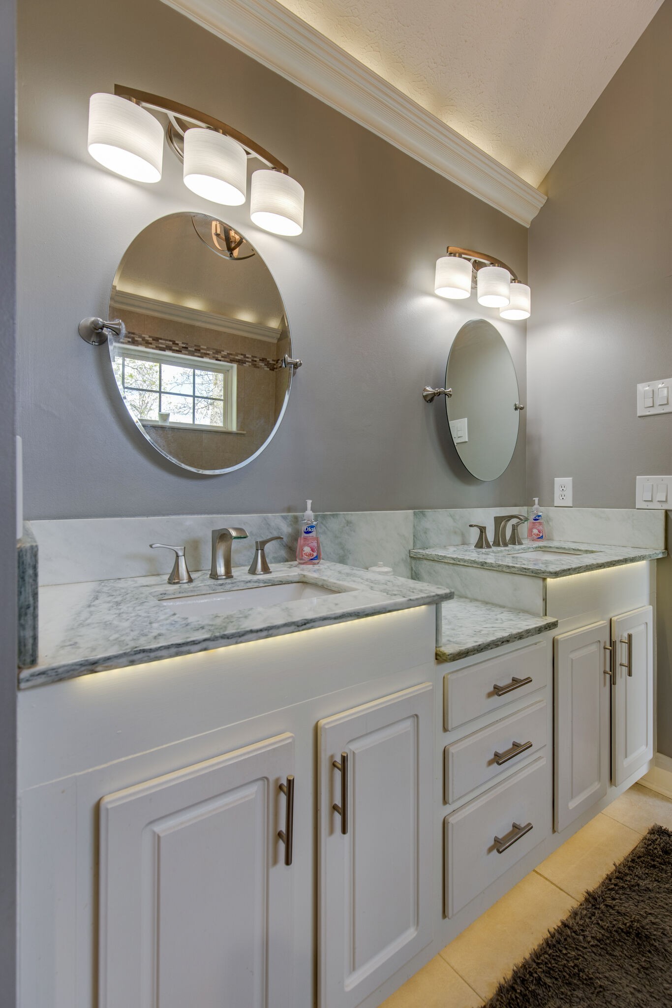 5236 Ridgefalls Way Antioch, TN 37013 - Photo 20 of 35 a bathroom with a sink vanity and mirror