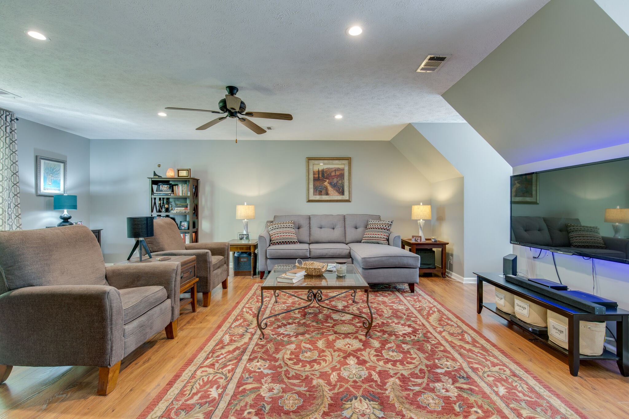 5236 Ridgefalls Way Antioch, TN 37013 - Photo 23 of 35 a living room with furniture and a flat screen tv